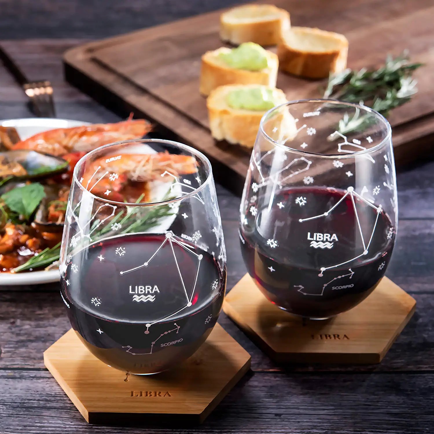 Set of 2 Zodiac Sign Wine Glasses with 2 Wooden Coasters by The Wine Savant - Astrology Drinking Glass Set with Etched Constellation Tumblers for Juice, Water Home Bar Horoscope Gifts 18oz (Libra)-1