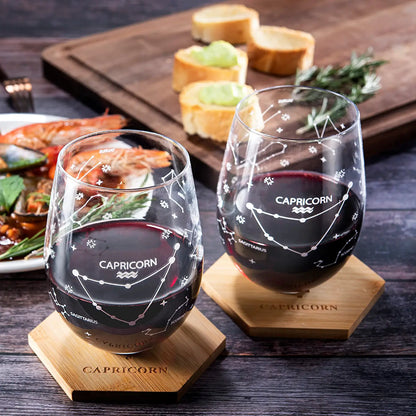 Set of 2 Zodiac Sign Wine Glasses with 2 Wooden Coasters by The Wine Savant - Astrology Drinking Glass Set with Etched Constellation Tumblers for Juice, Water Home Bar Horoscope Gifts 18oz (Capricorn)-1